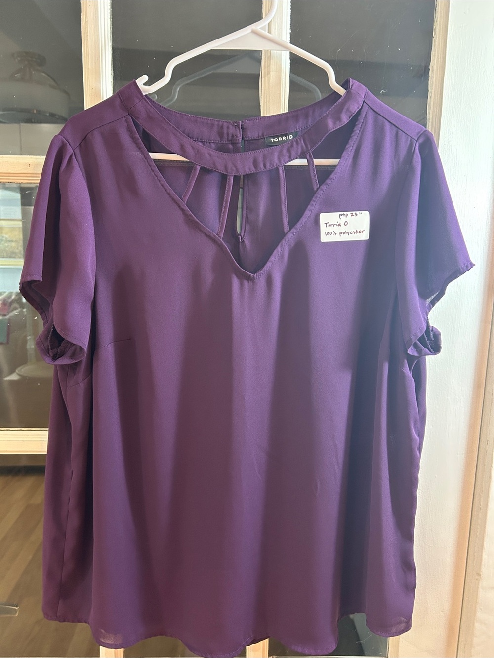 A47.   torrid Deep Purple Keyhole Short Sleeve Blouse